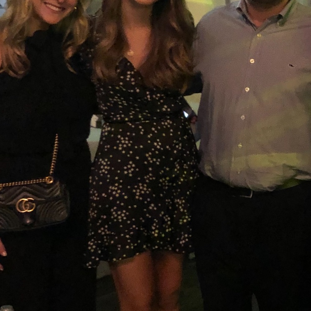 Black and white mini wrap dress with stars